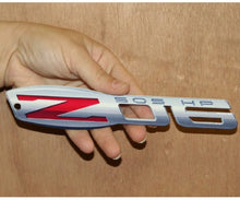 Load image into Gallery viewer, C6 Corvette ZO6 Metal Magnet Emblem Art Size: 6" x 2" Tool Box 06 through 13 Z06 505HP LS7