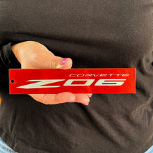 Load image into Gallery viewer, C8 Corvette ZO6 Red Steel Magnet Emblem Dusted Chrome Powder Finish 7.5&quot; by 1.75&quot; Z06
