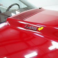 Load image into Gallery viewer, C3 Corvette 75-79 L-82 Hood Emblems Official GM Restoration Emblem Both Sides
